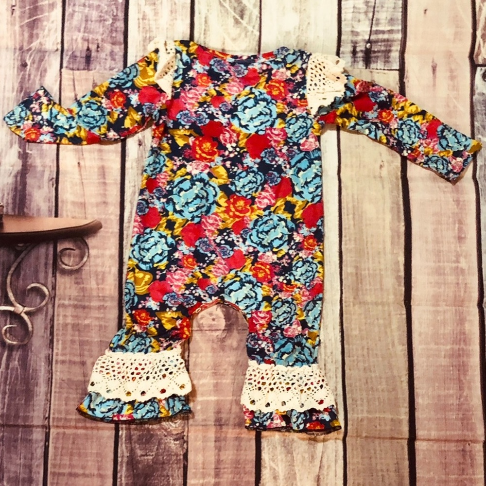 Cozy colorful flowered romper.